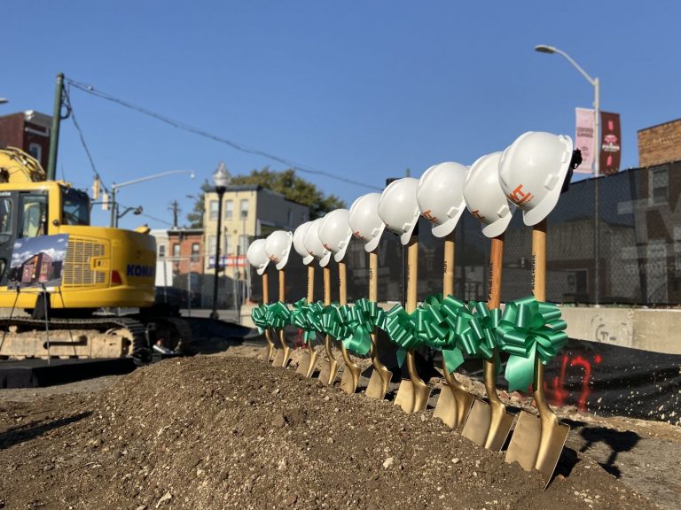 Now of hard hats on shovels.